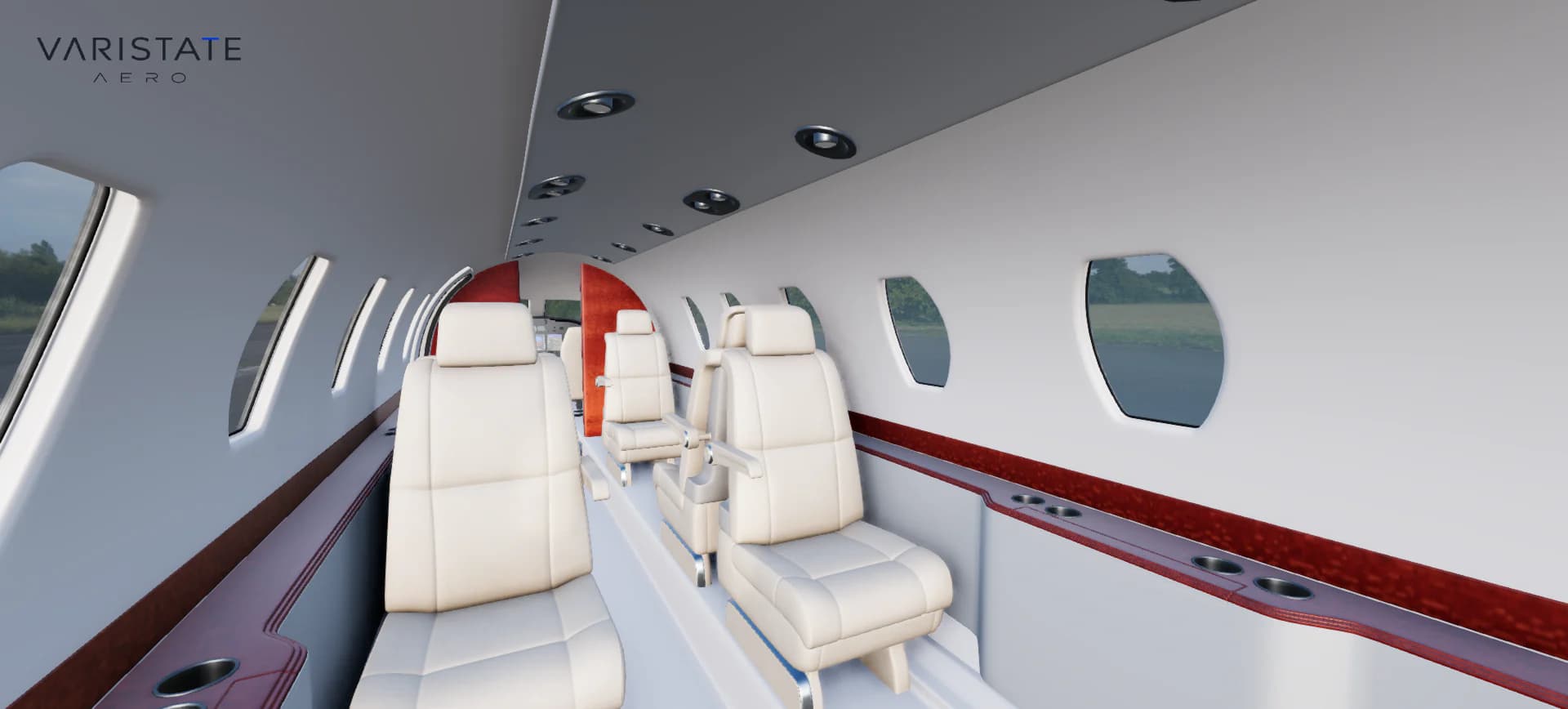 Private jet cabin with cream passenger seats, light walls and red wood-style side trim