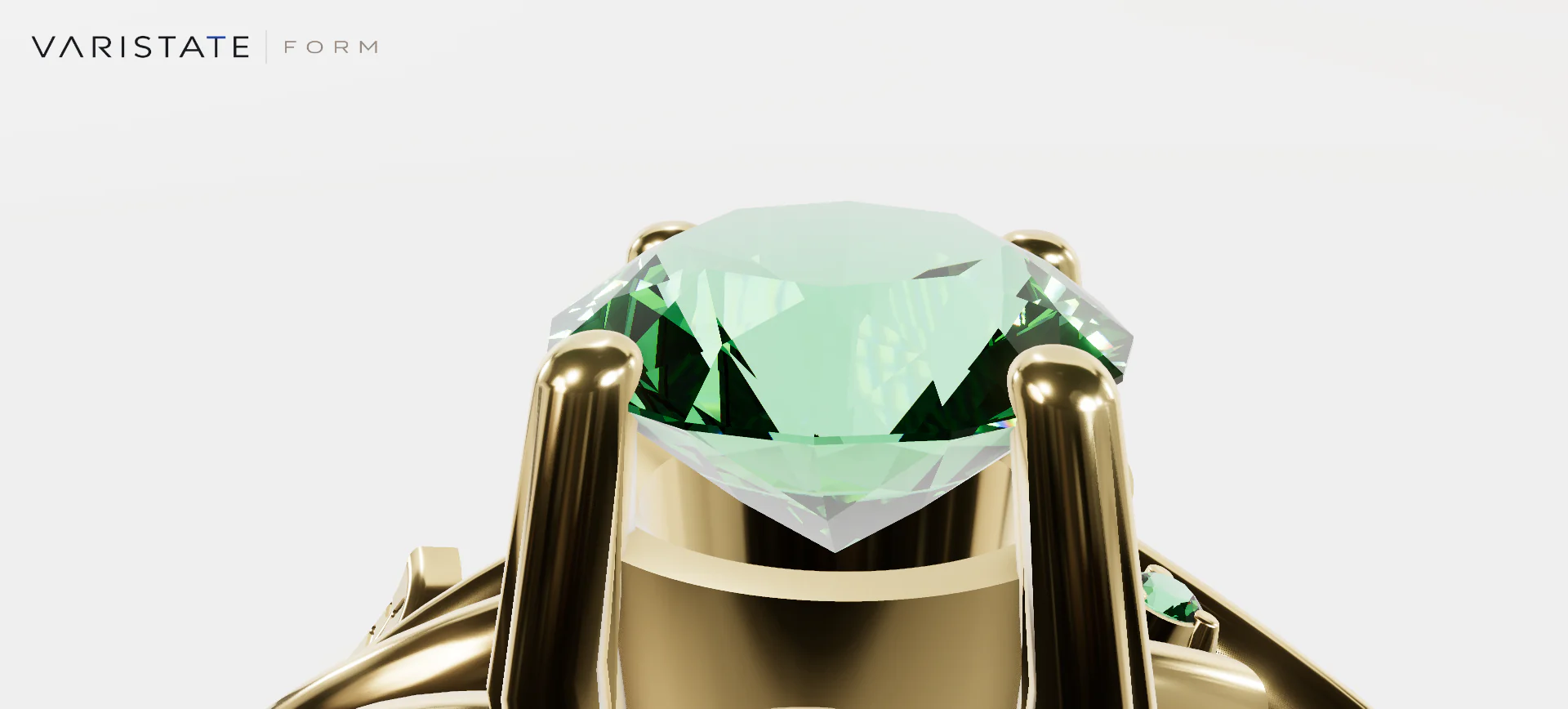 Close side view of a green emerald centre stone in a yellow-gold setting with polished prongs