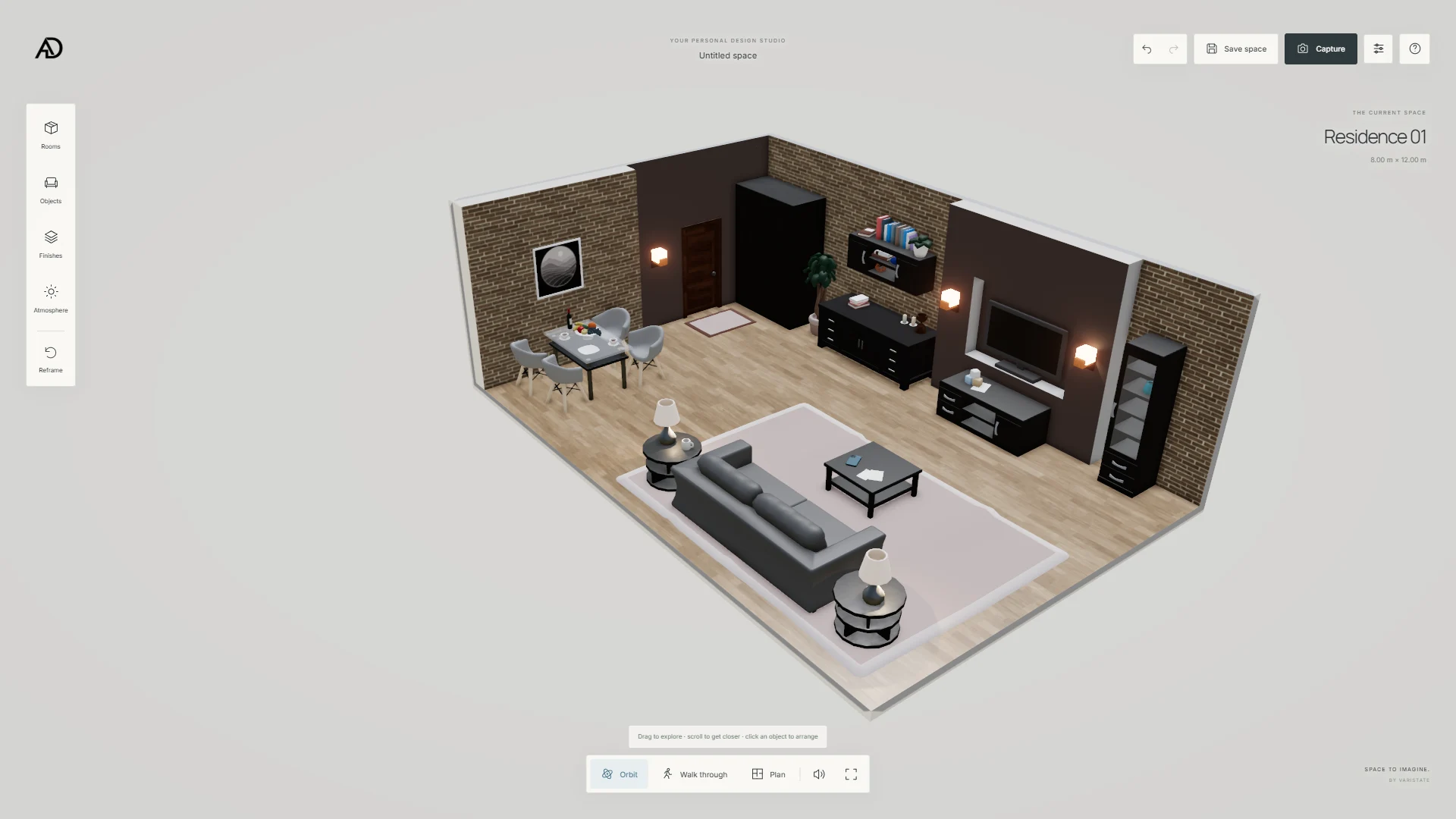 Furnished residence viewed from above in VariState SPACE with a dining table, grey sofa, brick walls and dark cabinetry